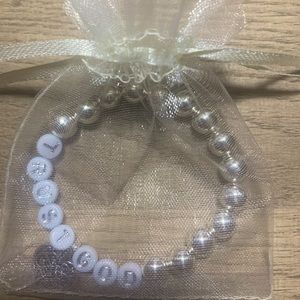 Faith Bracelets that is designed to rock, it is silver and white!